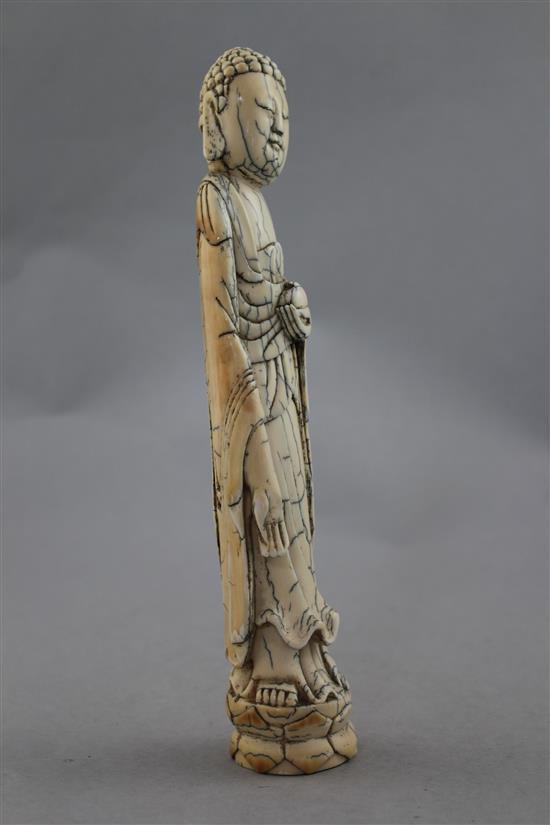 A Chinese ivory tusk carving of Buddha, Qing dynasty, 23.5cm.